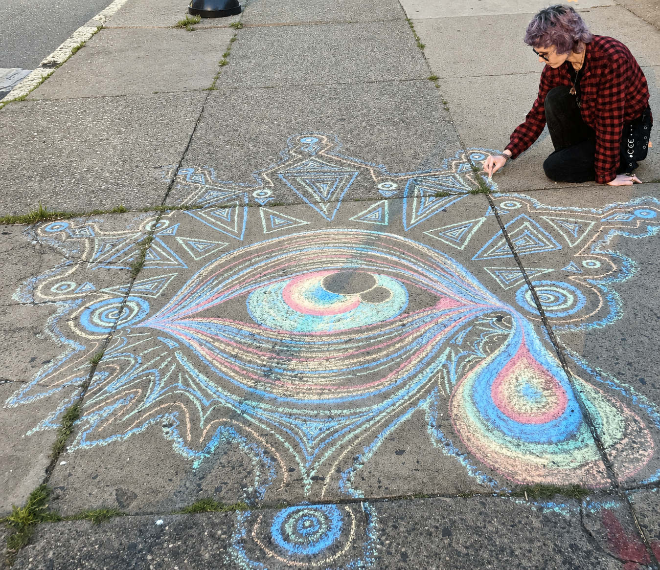 Kyro creating a chalk mandala